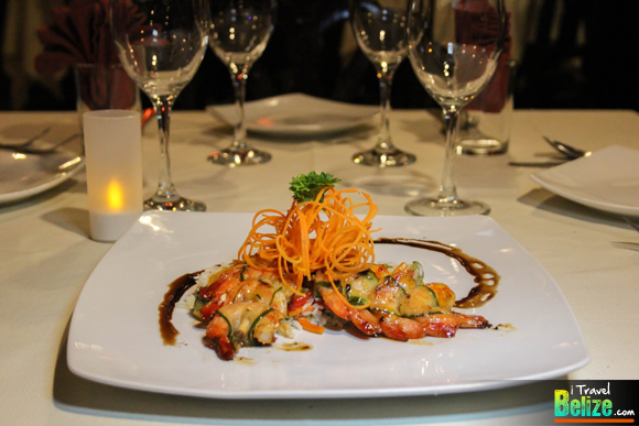Island Shrimp grilled and wrapped with cucumber, orange sauce glaze, served with veggie rice
