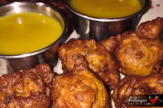 Conch Fritters with honey mustard dipping sauce - Belize Food