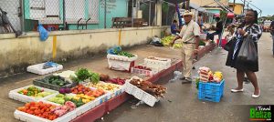 Vegitable and fruit shopping at Michael Finnegan Market in Belize City